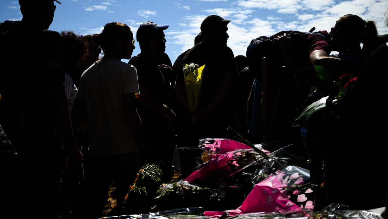 Friends and family members attend the funeral of Shiraz Tamam, who was killed by Hamas during the attack on the Nova music festival, at Holon cemetery on Oct. 17, 2023, in Israel.