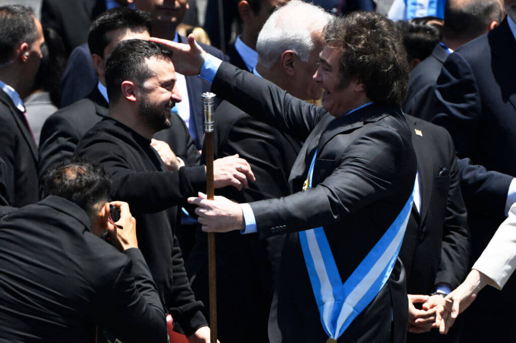 Argentina's president Javier Milei, right, is greeted by Ukraine's President Volodymyr Zelenskyy after delivering his speech before the crowd during an inauguration ceremony at the Congress in Buenos Aires on December 10, 2023.