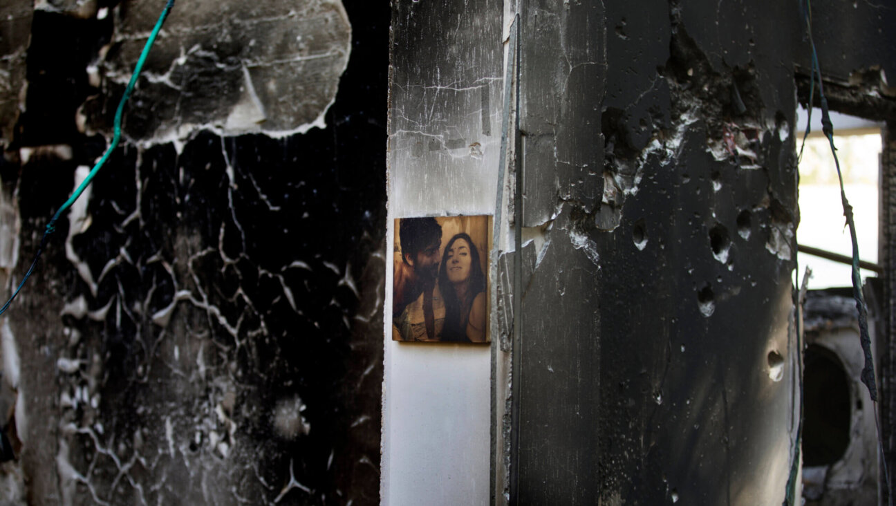 After their home was destroyed in the Oct. 7 attack, a photograph of Doron and Itamar Cohen remained intact on the wall — touched by fire, but not burned.