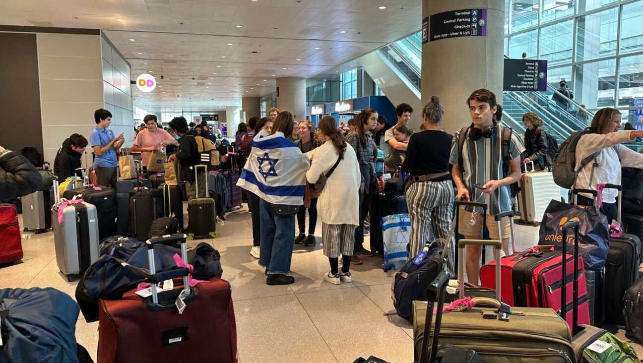 American students attending Alexander Muss High School in Israel wait to leave the country at Ben Gurion Airport in the days after the Oct. 7 attack.