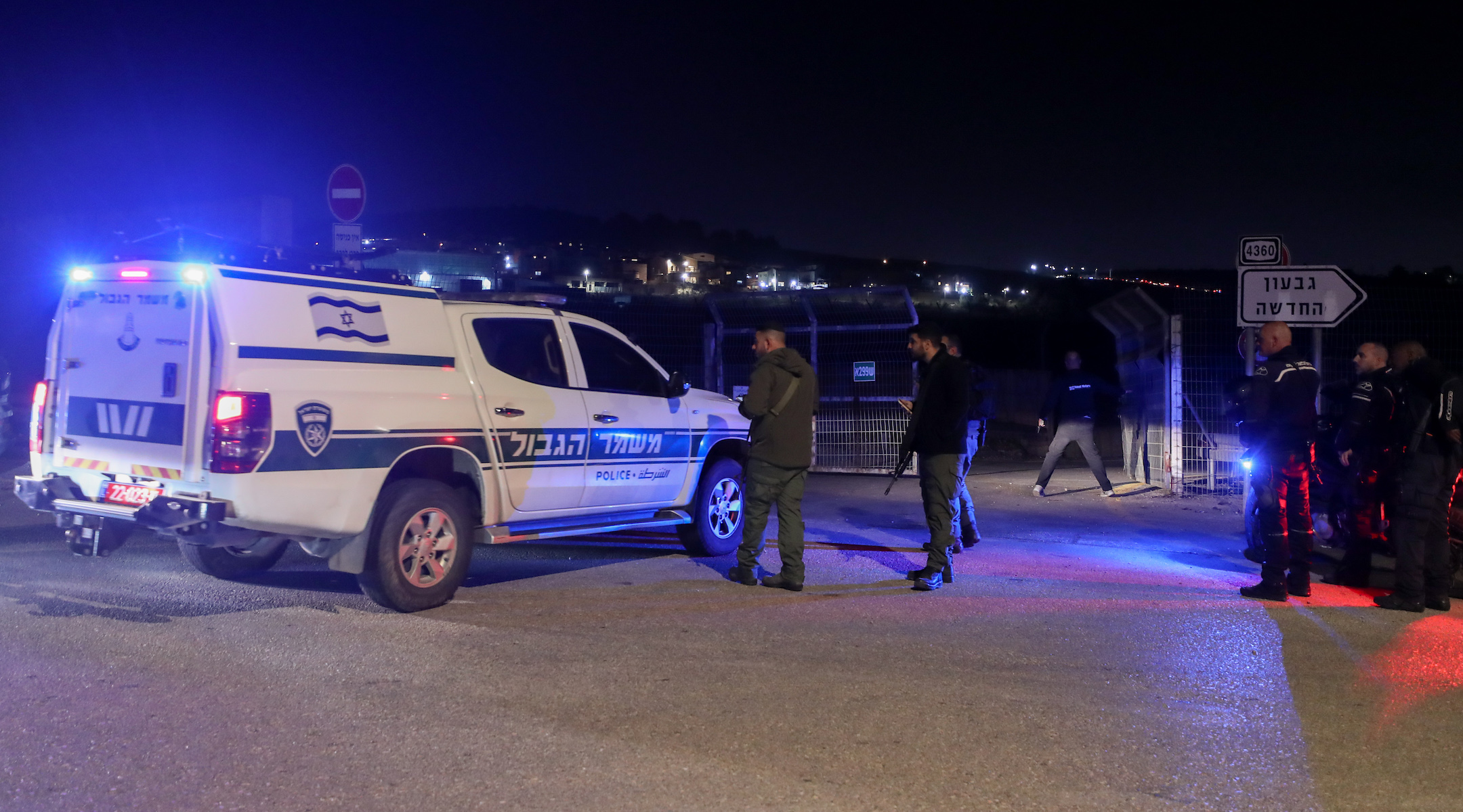 Police and security personnel near the scene of a car-ramming in the West Bank on January 7, 2024. (Jamal Awad/Flash90)