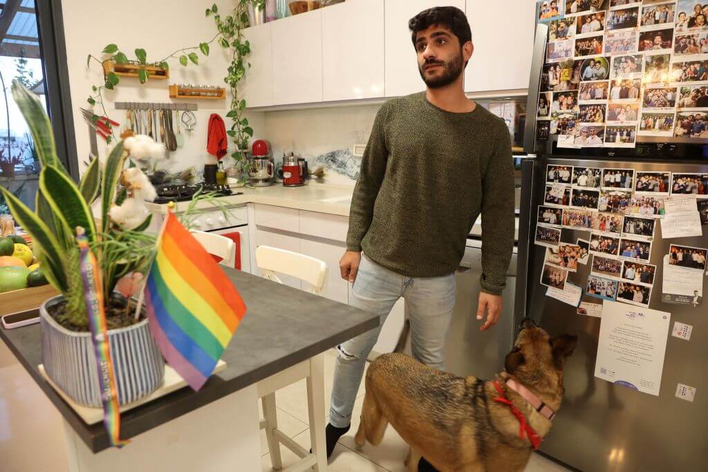 Omer Ohana, the partner of Israeli army captain Sagi Golan who was killed in the October 7 attack by Hamas militants, speaks during an interview at his flat in the Israeli coastal city of Herzliya on November 19, 2023. 