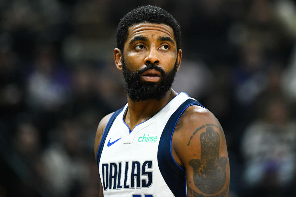 SALT LAKE CITY, UTAH - JANUARY 01: Kyrie Irving #11 of the Dallas Mavericks looks on during a game against the Utah Jazz at Delta Center on January 01, 2024 in Salt Lake City, Utah.