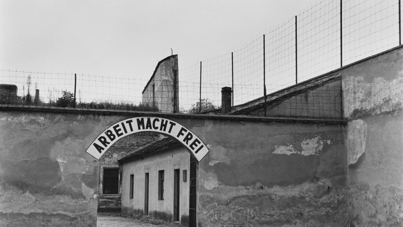 The slogan "Arbeit Macht Frei" is seen over the gateway to the Nazi concentration camp of Theresienstadt.