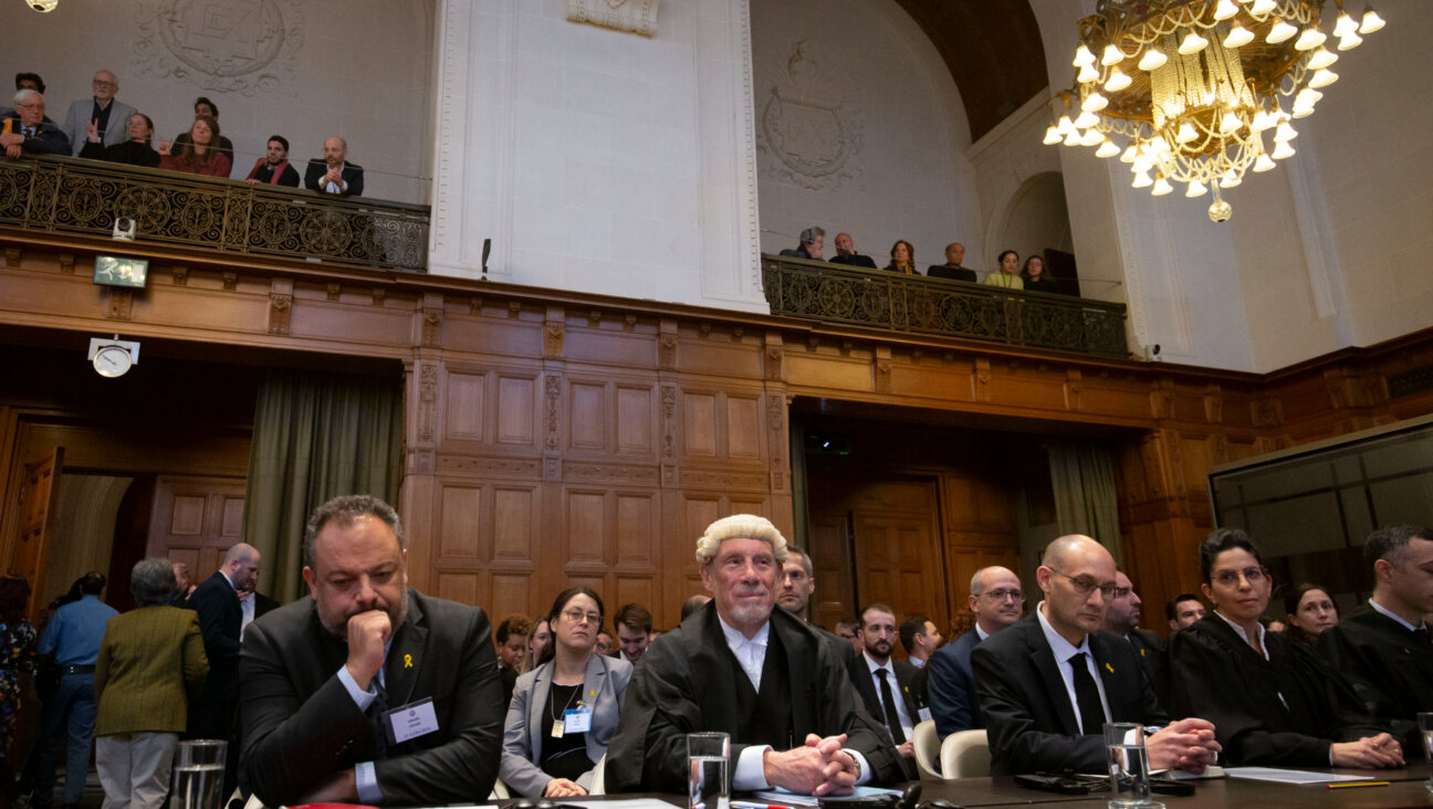 Israeli lawyer Tal Becker (left) and  barrister Malcolm Shaw of Great Britain are part of the Israeli team at the International Criminal Court in the Hague on Jan. 11. The court is considering a case in which South Africa has accused Israel of genocide in Gaza.