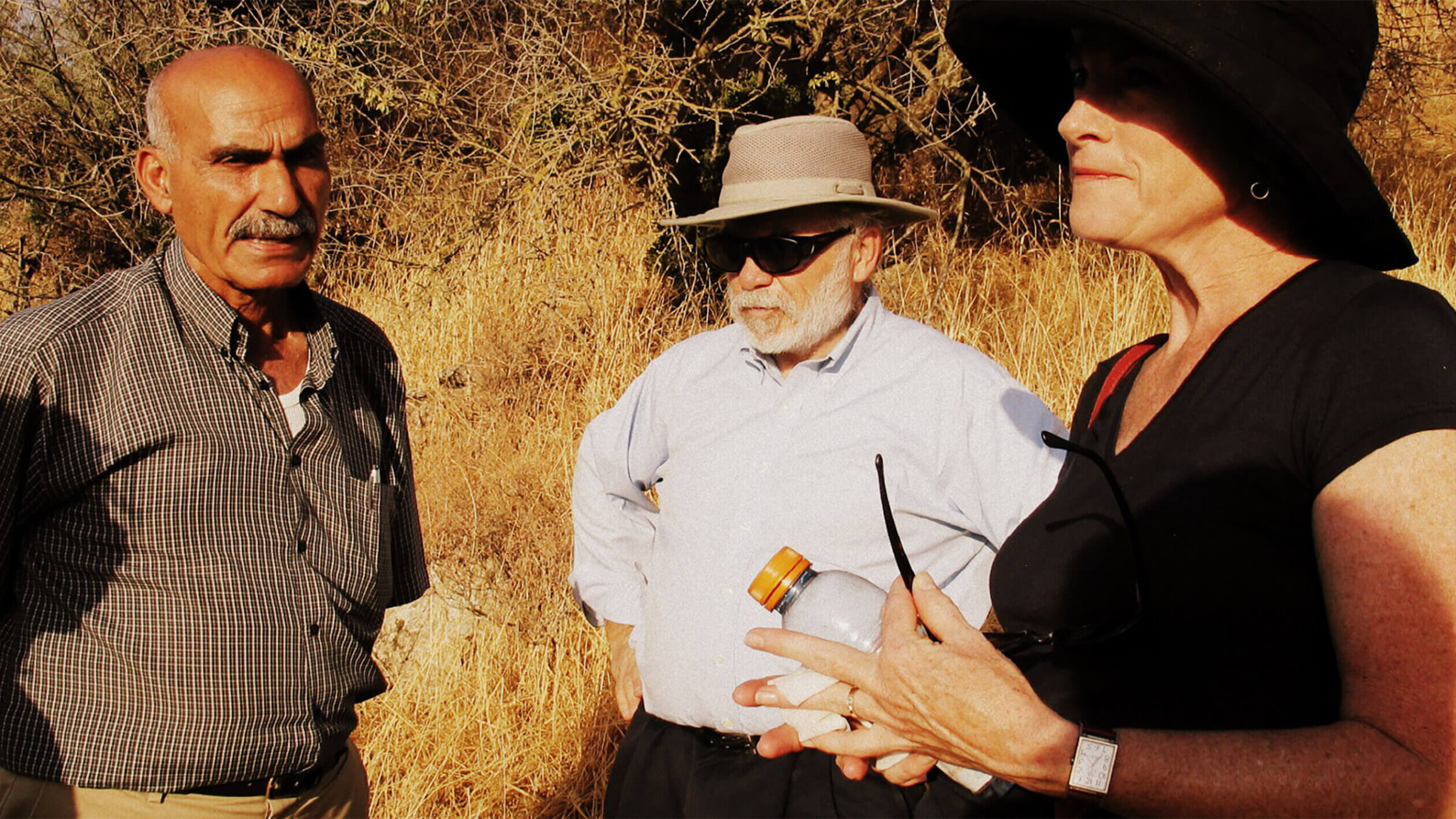 Menachem Daum (center) with Yakoub Oded (left) on the set of <i>The Ruins of Lifta</i>, 2012.