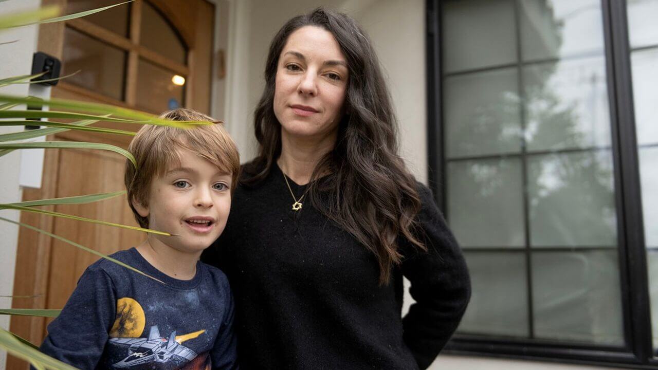 Rebecca Feigelson is moving her son Jacob, 6, from the Oakland school district to Piedmont over anti-Zionist statements from the Oakland teachers union, seen in Oakland on Dec. 31, 2023.