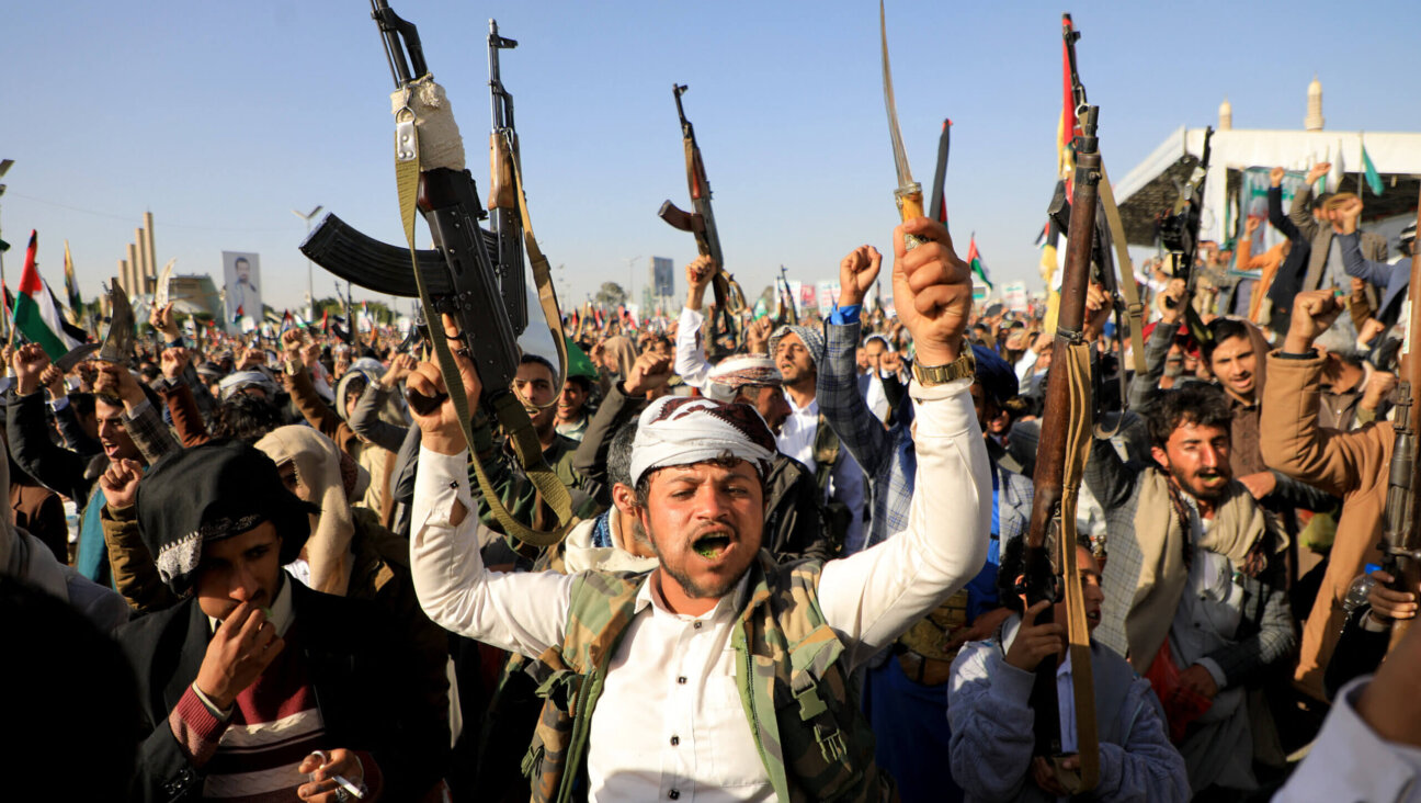 Houthi fighters during a protest following U.S. and British strikes, in the capital Sanaa, Jan. 12. The Iranian-backed militia claims it is attacking shipping lanes in solidarity with Palestinians in Gaza. 