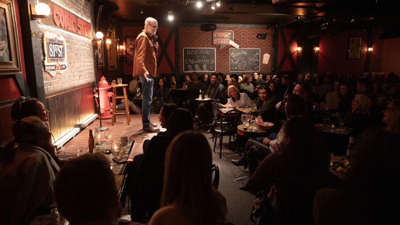 Erik Angel in a stand-up comedy show in New York.