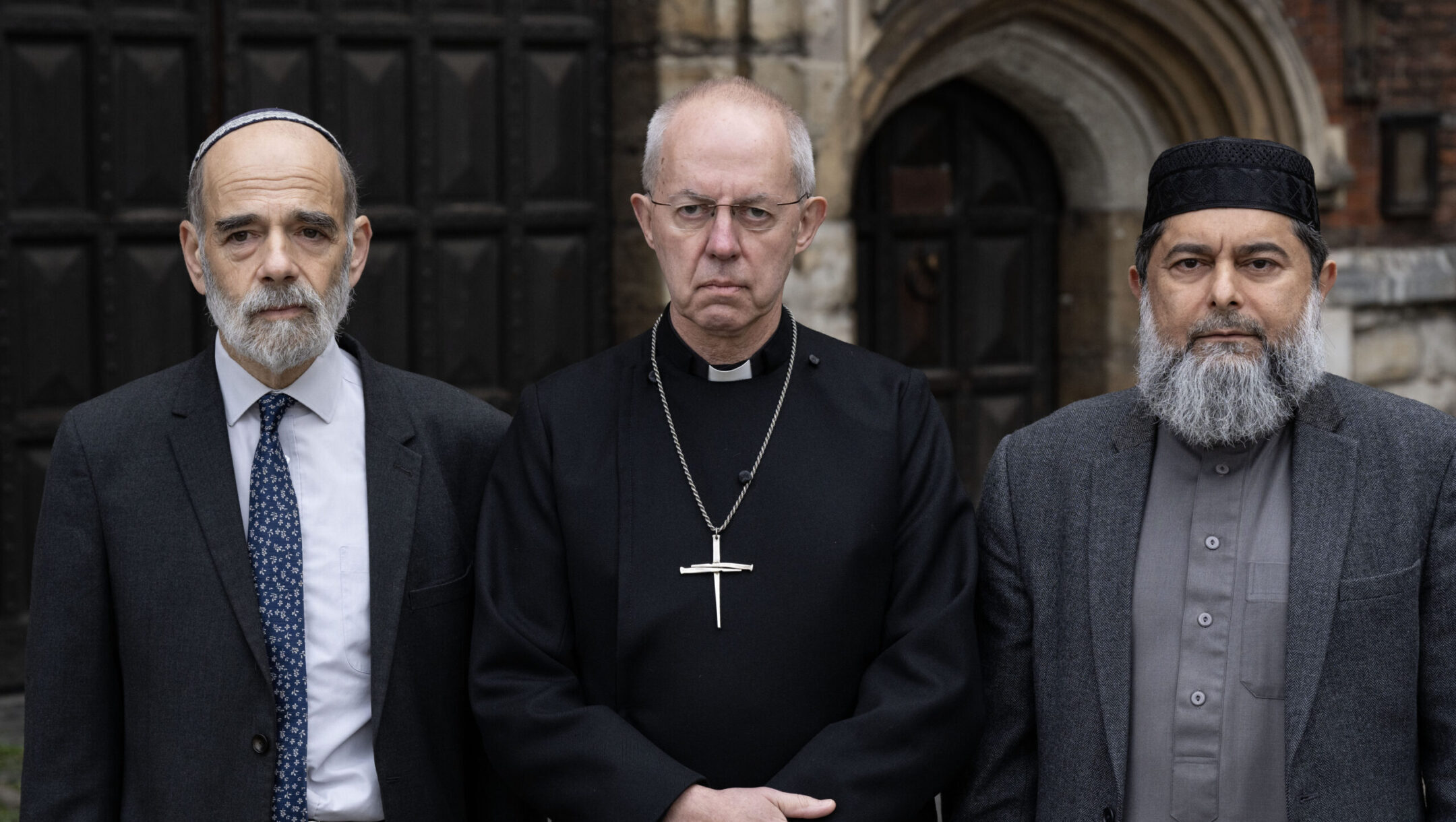 (L-R) Rabbi Jonathan Wittenberg, Archbishop of Canterbury Justin Welby and Sheikh Ibrahim Mogra make a statement at Lambeth Palace in London urging peace among faith communities in the United Kingdom, following the onset of the Israel-Hamas war, Oct. 17, 2023. (Doug Peters/PA Images via Getty Images)