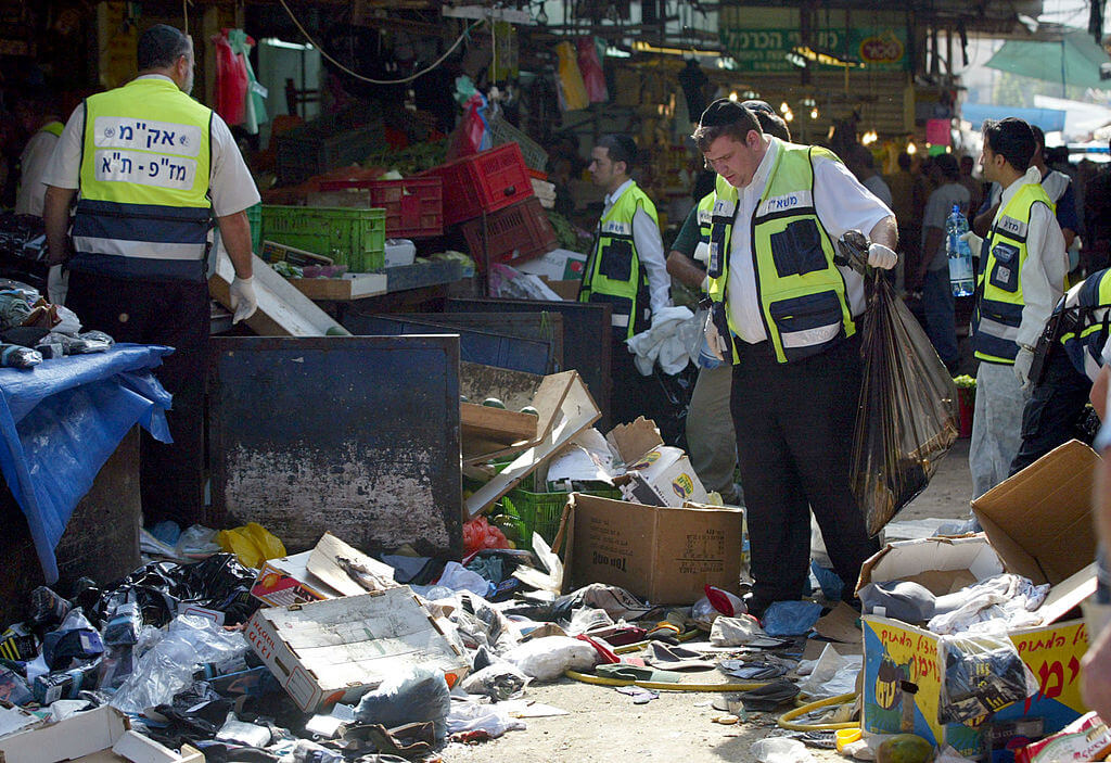 The scene of a Palestinian suicide bombing at Tel Aviv's Carmel Market, Nov. 1, 2004. Basim Khandaji, who has just been nominated for a prestigious literary award, was sentenced to life in prison in Israel for his role in planning and carrying out the deadly attack. 