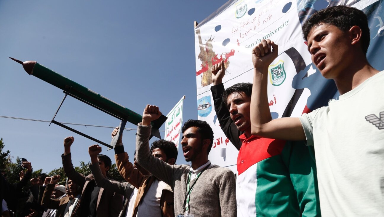 Yemenis including university academics and students chant slogans as they protest against the U.S.-U.K. airstrikes on Yemen, and in solidarity with Palestinians, in Sana'a, Yemen, Jan. 31, 2024. (Mohammed Hamoud/Getty Images)