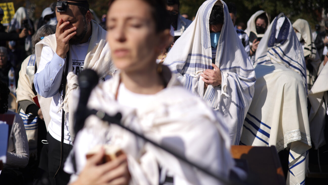 Rabbi Yoseph Berman a Jewish morning prayer service near the U.S. Capitol in November as part of a demonstration with Rabbis for Ceasefire. Berman also signed onto a ceasefire letter Friday organized by T'ruah, a liberal rabbinic group.