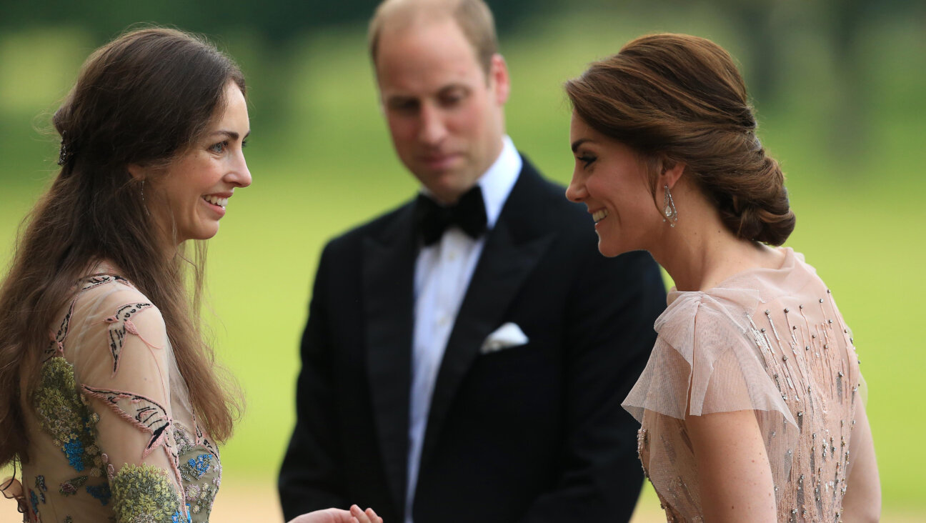 Prince William and Kate Middleton greet Rose Cholmondeley at Houghton Hall.