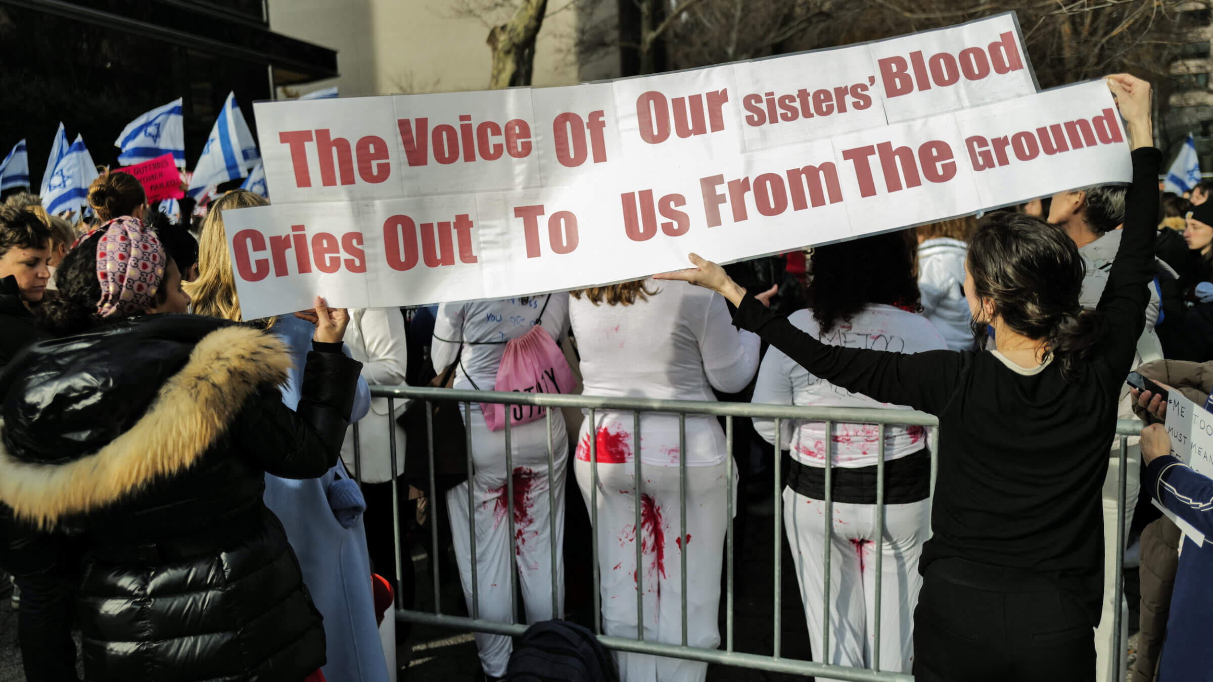 Demonstrators gather during a "#metoo unless you are a Jew" protest outside of United Nations headquarters in New York City. 