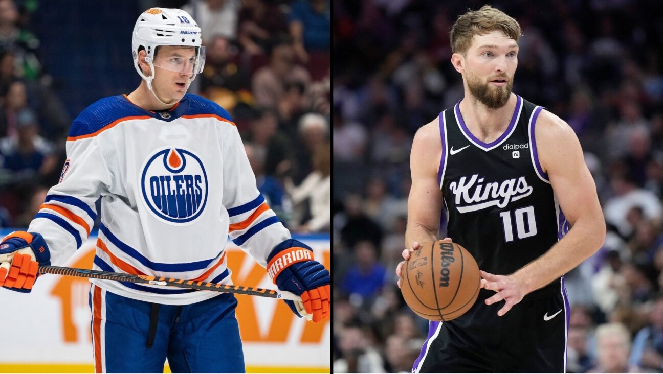 Zach Hyman, left, and Domantas Sabonis, right, are enjoying historic seasons. (Getty Images)