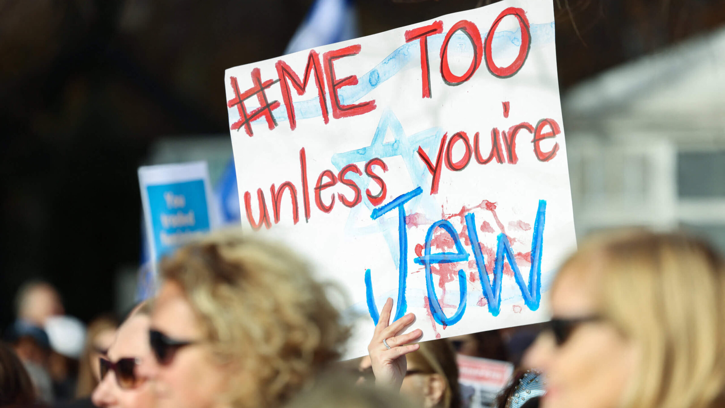 Demonstrators gather during a protest outside of United Nations headquarters in New York City, accusing the international rights group of staying silent over alleged rapes of Israeli women committed by Hamas militants, Dec. 4.