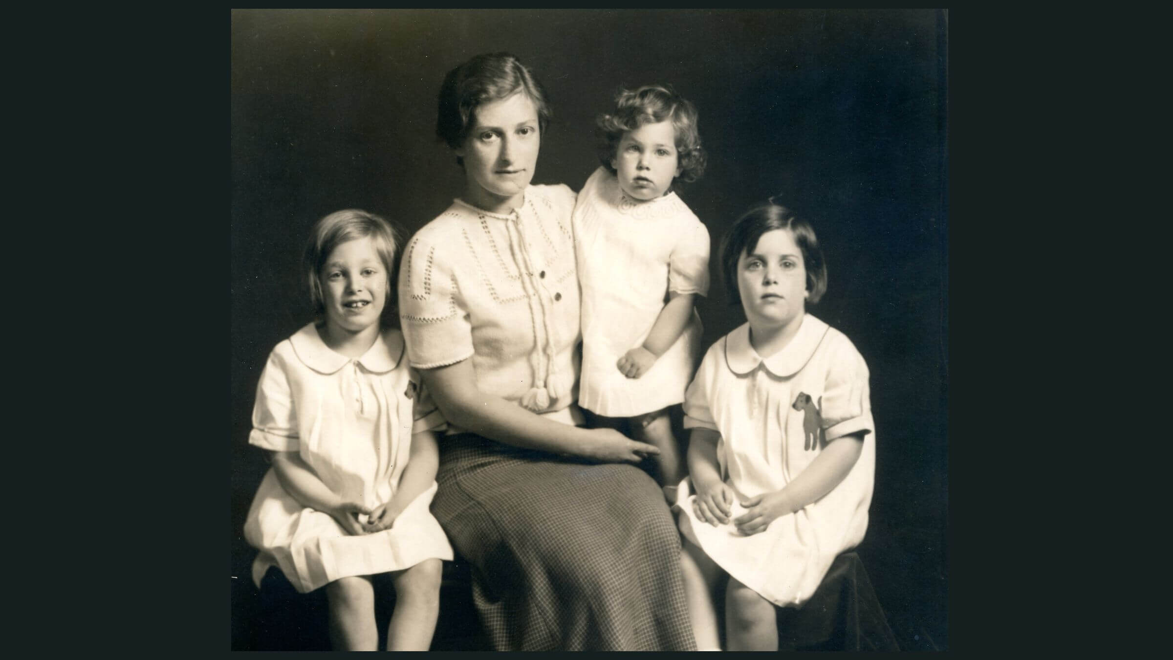 This 1932 photo shows Eleanor Kohn Levy, seated in the center, with her daughters: Susan, to her left, Ruth, in her lap, and Ellen, to her right.