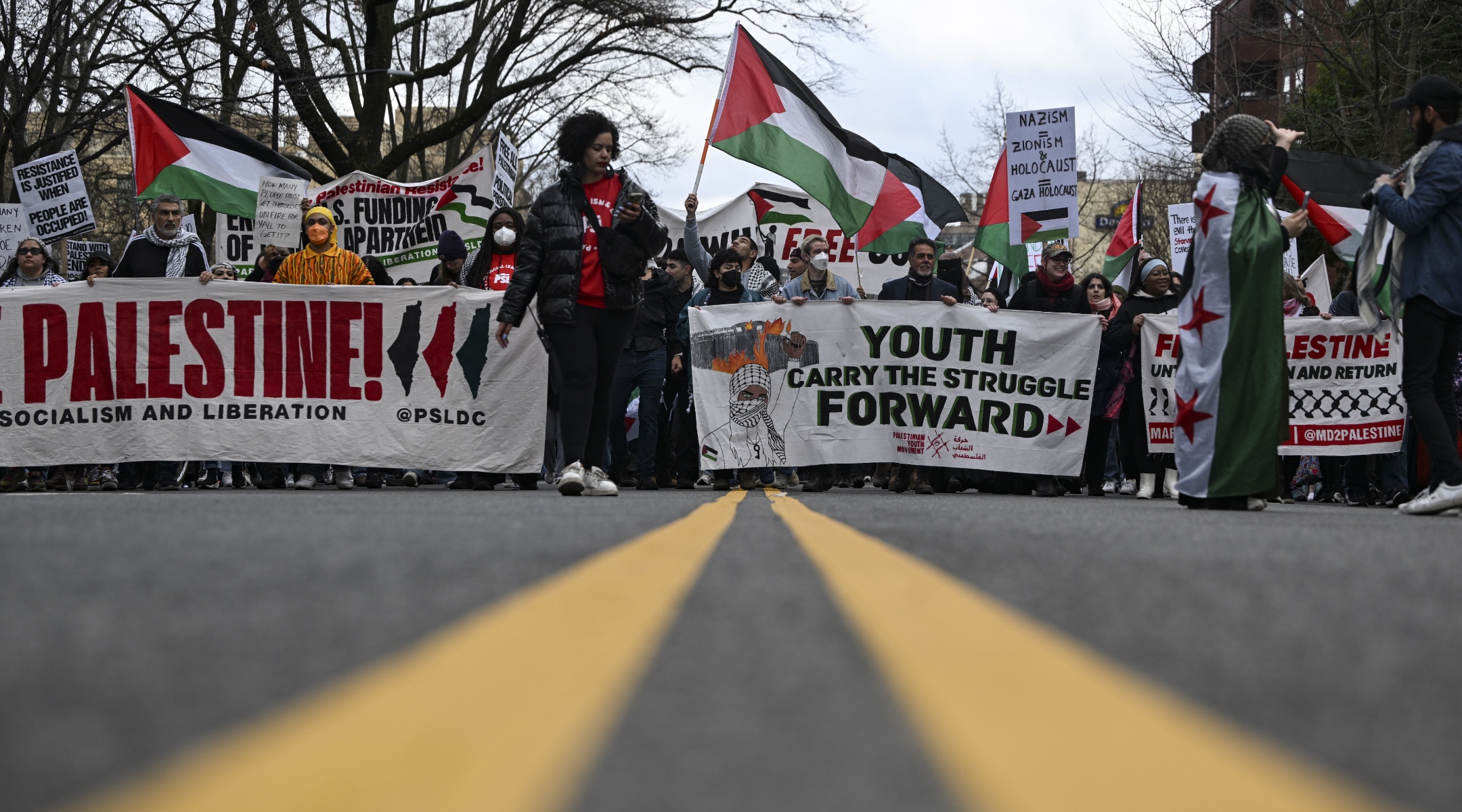 Demonstrators gather outside of the Israeli Embassy to demand for a cease-fire in the Gaza Strip in Washington DC, March 2, 2024. (Celal Gunes/Anadolu via Getty Images)