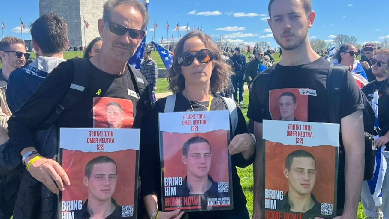 <i>From left</i>, Ronen, Orna and Daniel Neutra, the parents and younger brother of Omer Neutra, a hostage in Gaza. 