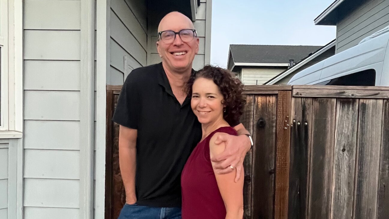 Amy Ettinger, shown with her husband Dan White, wrote about ice cream, mah-jongg and her mother’s kugel recipe. (Courtesy Dan White, via X)