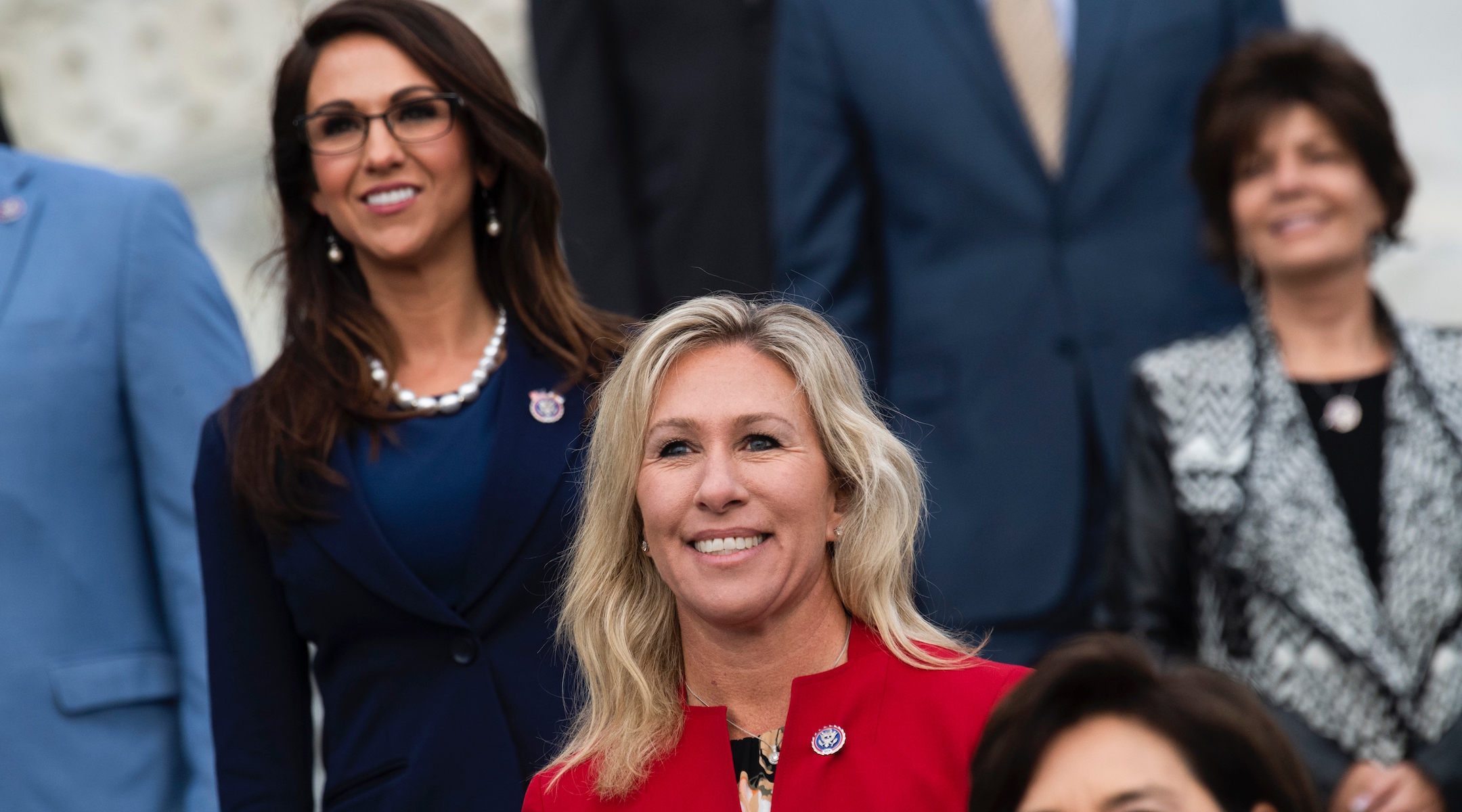 Reps. Marjorie Taylor Greene, center, and Lauren Boebert, left, are seen during a group photo with freshmen members of the House Republican Conference in Washington, D.C., Jan. 4, 2021. (Tom Williams/CQ-Roll Call, Inc via Getty Images)