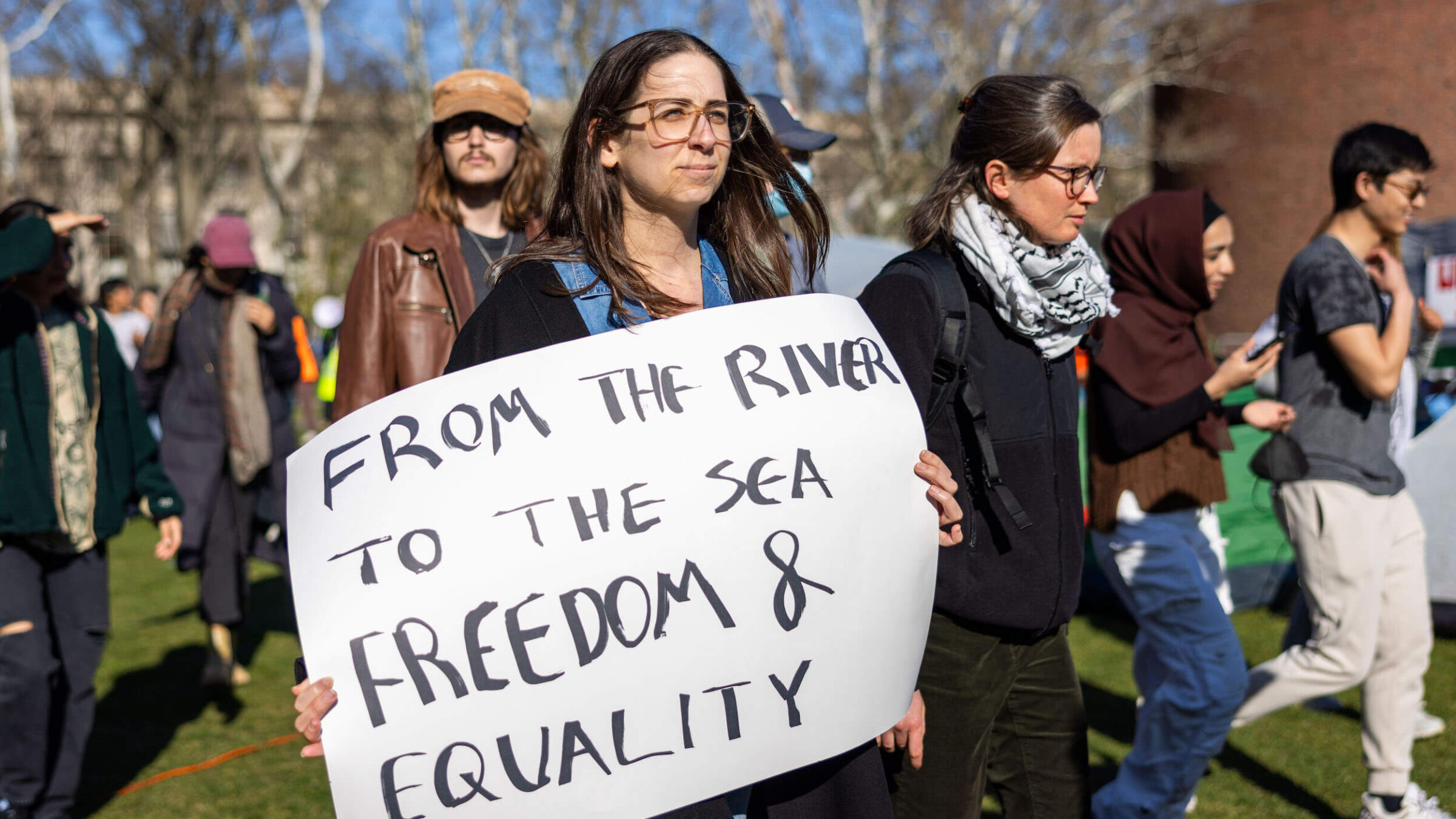 Students from Harvard University and the Massachusetts of Technology rally at a protest encampment by The Scientists Against Genocide at MIT on April 22. 