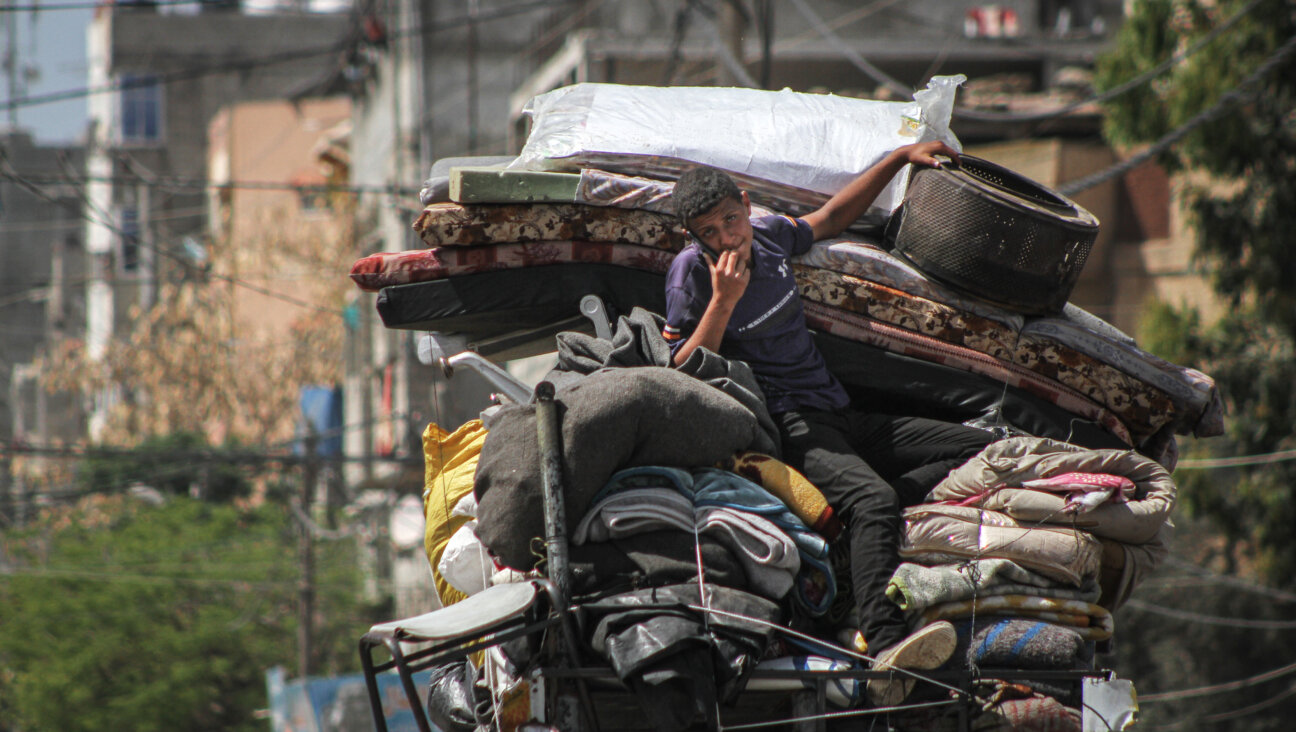 Palestinians flee the center of Rafah, Gaza, on Thursday, May 9, 2024.A