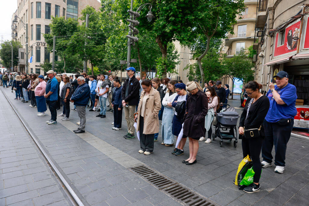 Israelis observe two minutes of silence on a street in Jerusalem to mark the Memorial Day for fallen soldiers on May 13.