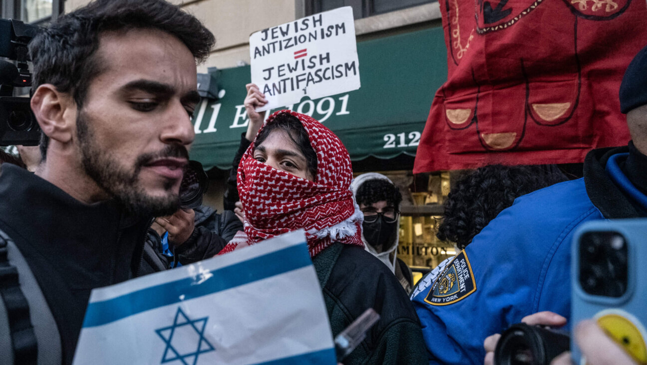 Israel supporters clash with pro-Palestinian protesters as they participate in the United for Israel march outside of Columbia University on April 25, 2024.