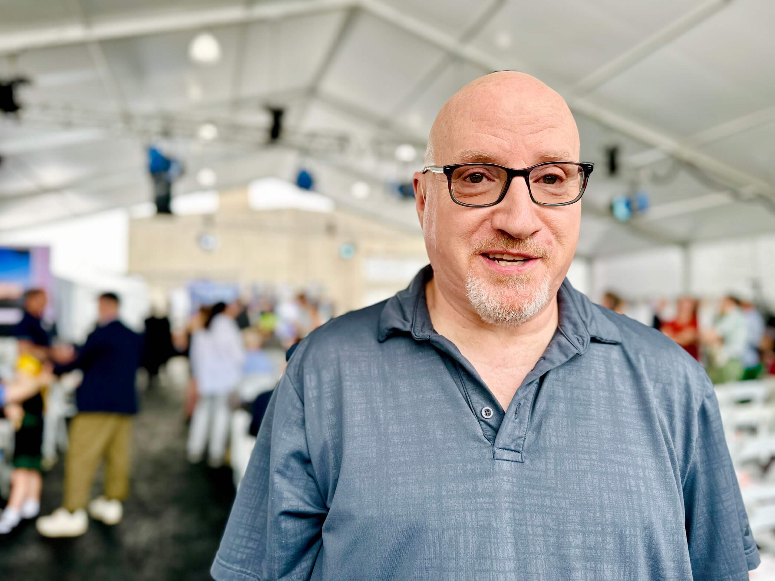 Stephen Weiss, a survivor of the Tree of Life shooting, at a 2024 groundbreaking ceremony for a new building on the site.