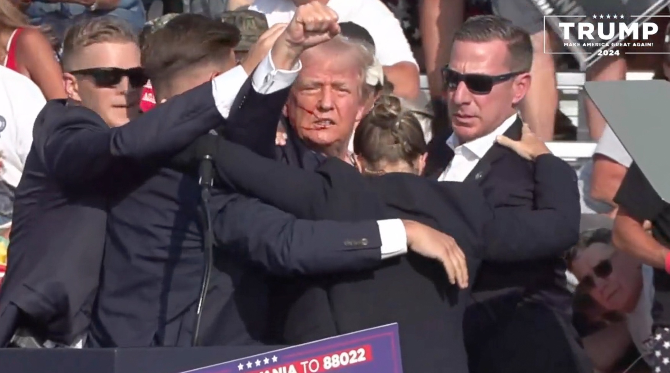 In a screen grab captured from a video, Republican presidential candidate and former President Donald Trump appears to be injured after gunshots were reported at a rally in Butler, Pennsylvania, July 13, 2024. (Anadolu/Getty Images)