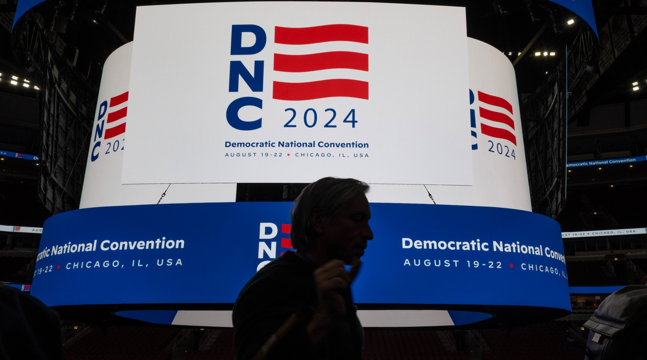 The logo for the Democratic National Convention is displayed on the scoreboard at the United Center during a media walkthrough in Chicago, Jan. 18, 2024. (Scott Olson/Getty Images)