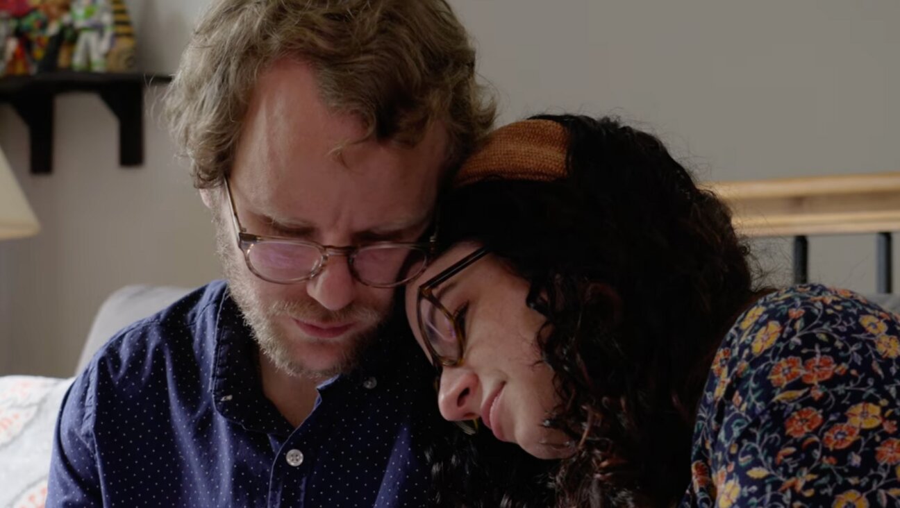 Gabe and Liz Rutan-Ram in a still from a campaign ad from Americans United for the Separation of Church and State. (YouTube)