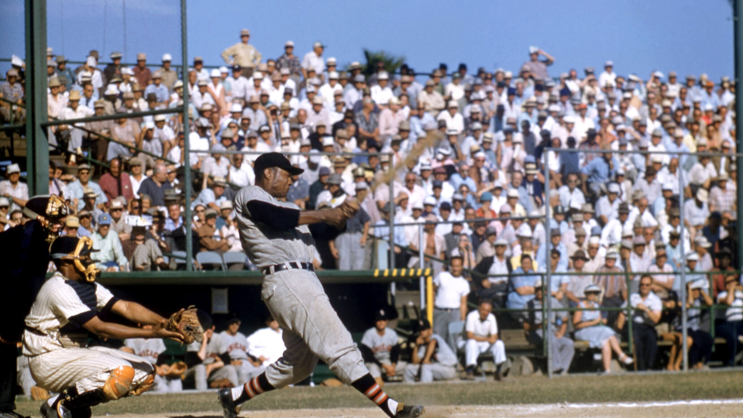  Larry Doby plays for the White Sox during a 1956 spring training game.