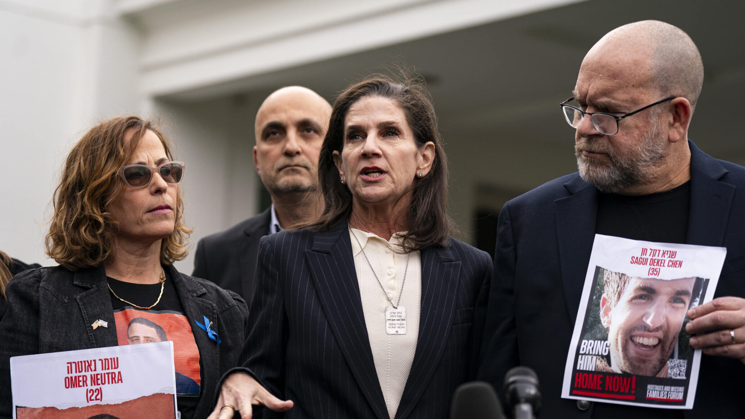 From left, hostage family members Orna Neutra, Liz Hirsh Naftali and Jonathan Dekel-Chen are shown outside the White House.