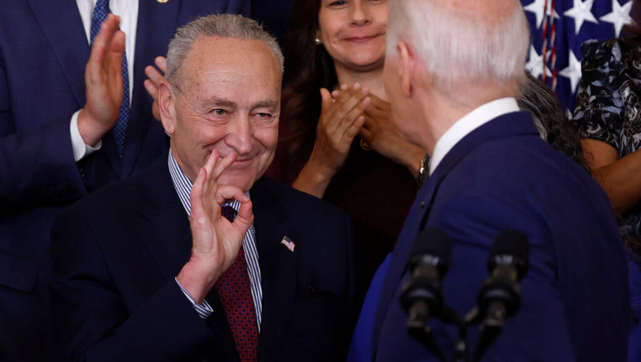 Senate Majority Leader Charles Schumer (D-NY) motions to President Joe Biden on June 18, 2024. 