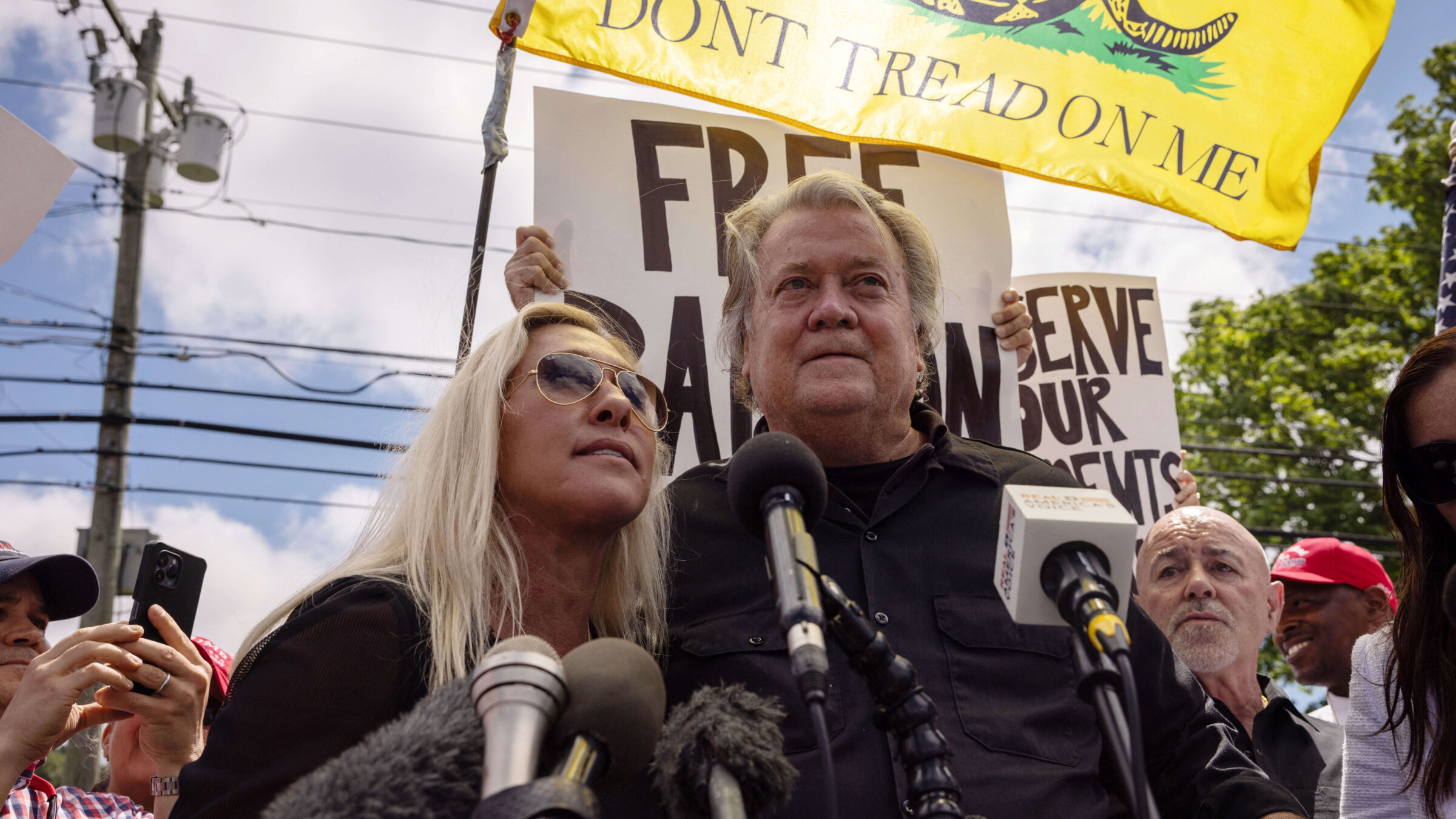 Former top Donald Trump advisor Steve Bannon and Rep. Marjorie Taylor Greene, Republican of Georgia.