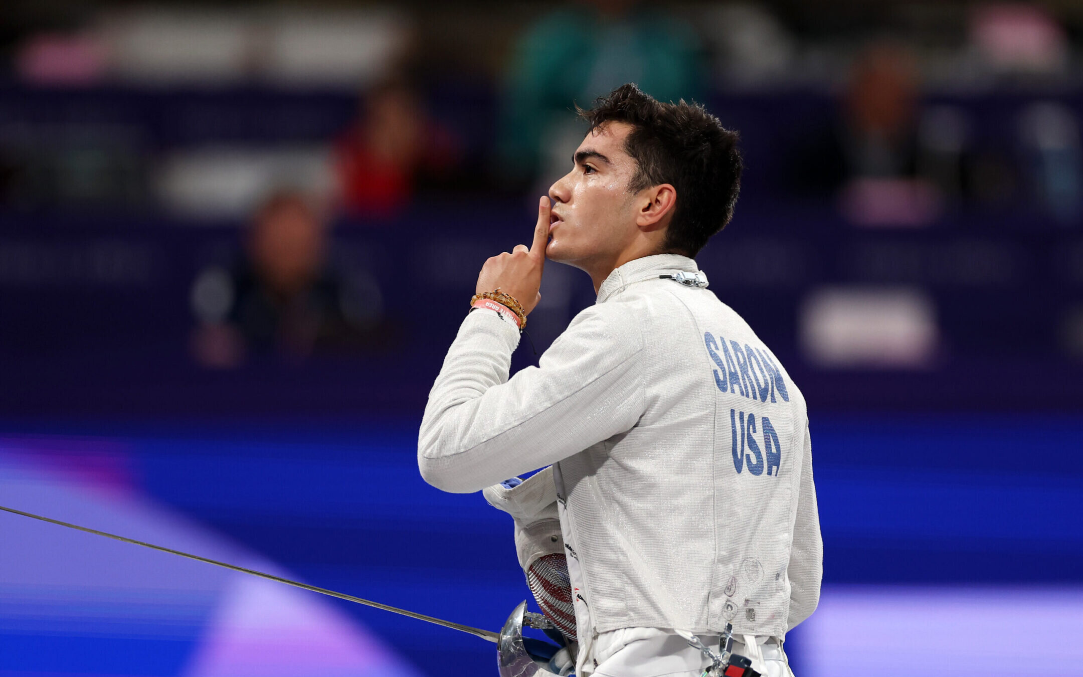 Mitchell Saron of Team United States, one of six Jewish fencers on the team, reacts during day one of the Olympic Games at the Grand Palais in Paris, July 27, 2024. (Patrick Smith/Getty Images)