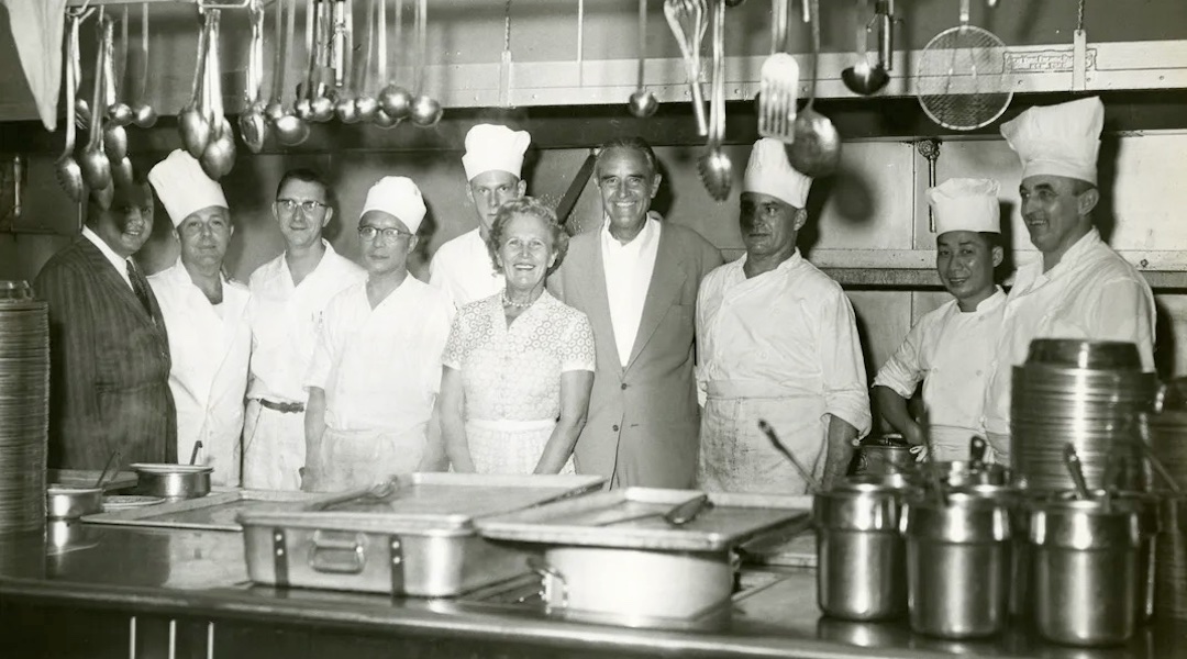 A 1958 photo of Jennie Grossinger and the kitchen staff at her eponymous Catskills resort is featured in a new exhibit at the Borscht Belt Museum in Ellenville, New York. (Borscht Belt Museum via YIVO)