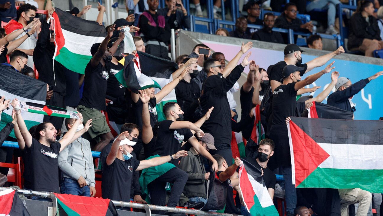 Fans waved Palestinian flags and gave Nazi salutes during the Israeli national anthem prior to Israel’s match against Paraguay at the 2024 Paris Olympics, July 27, 2024, in Paris. (Geoffroy Van der Hasselt/AFP via Getty Images)