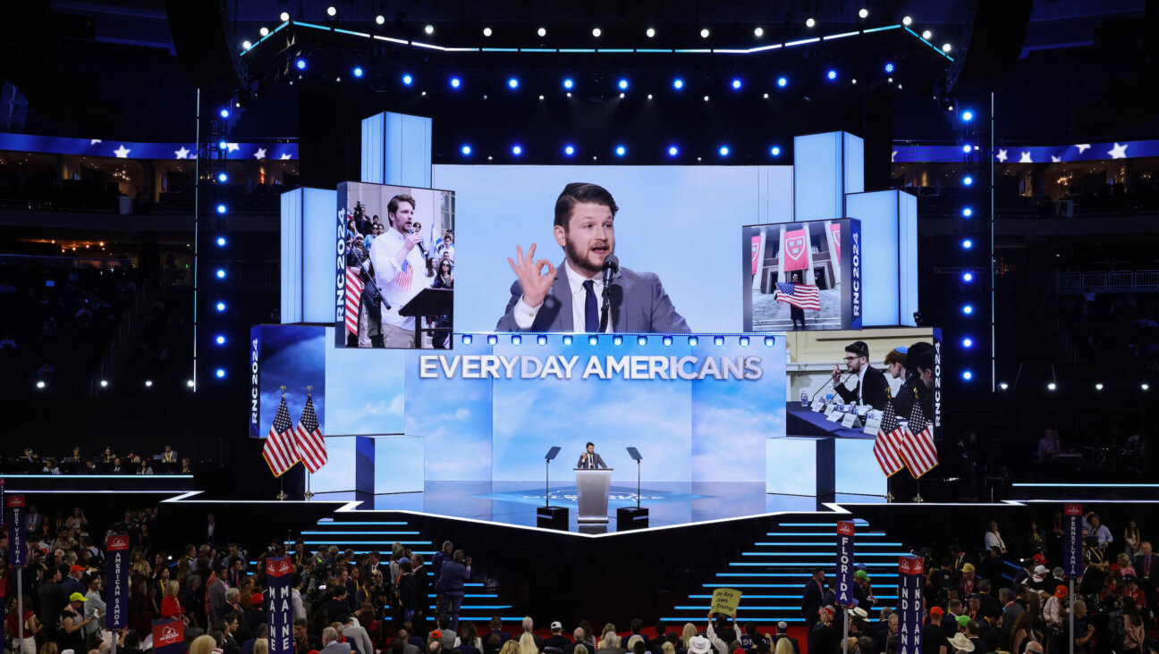 Shabbos Kestenbaum speaks on stage at the 2024 Republican National Convention in Milwaukee. 