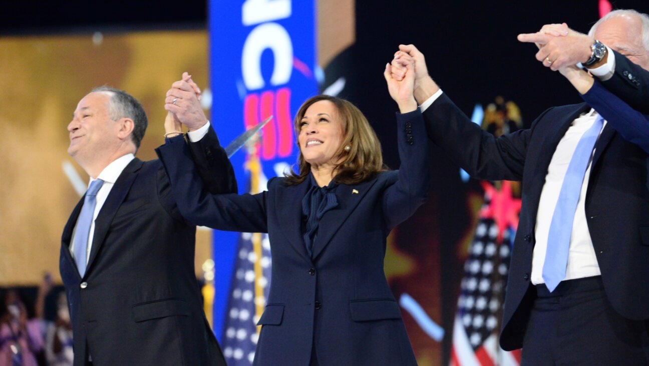 U.S. Vice President Kamala Harris, U.S. Second Gentleman Doug Emhoff, Tim Walz, governor of Minnesota and Democratic vice-presidential nominee, and his wife Gwen Walz during the Democratic National Convention at the United Center. Chicago, August 22, 2024. (Jacek Boczarski/Anadolu via Getty Images)