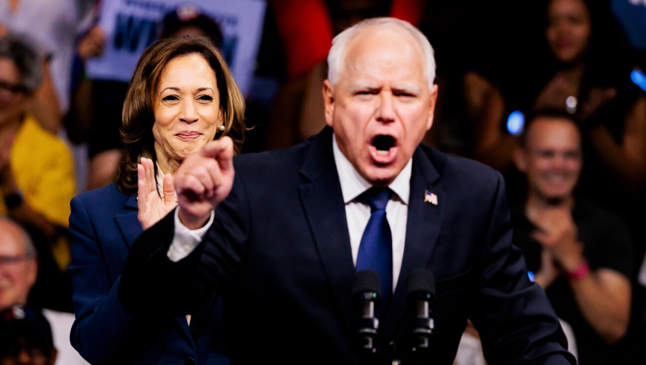 Tim Walz and Kamala Harris during a campaign event in Philadelphia, Pennsylvania, US, on Tuesday, Aug. 6, 2024. Harris tapped Walz as her running mate, enlisting him to build an electoral coalition of coastal progressives and Midwest moderates to block Donald Trump from the White House. Photographer: Hannah Beier/Bloomberg via Getty Images