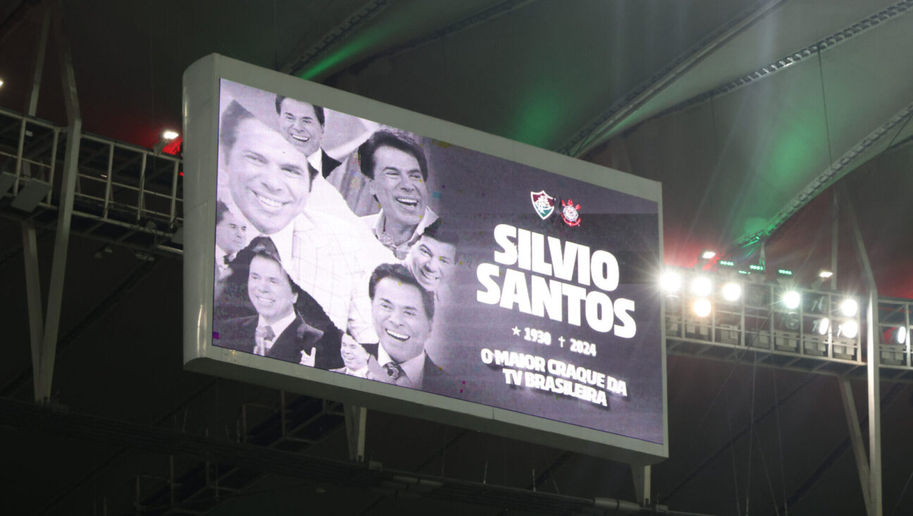 The Brazilian soccer team Fluminense paid tribute after the death of TV presenter Silvio Santos prior to its match in Rio de Janeiro, Aug. 17, 2024. (Wagner Meier/Getty Images)