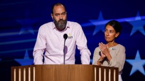 Jon Polin and Rachel Goldberg-Polin, parents of Hersh Goldberg-Polin, speak on stage during the third day of the Democratic National Convention Aug. 21 in Chicago.