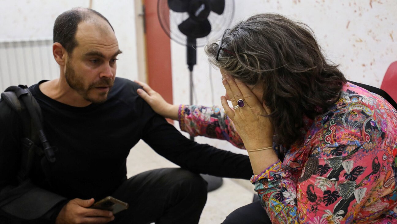 Colleagues of Aysenur Ezgi Eygi, an American Turkish activist who died after reportedly being shot in the West Bank town of Beita, react on news of her death in a hospital in Nablus in the West Bank on Sept. 6, 2024. (AFP via Getty Images).