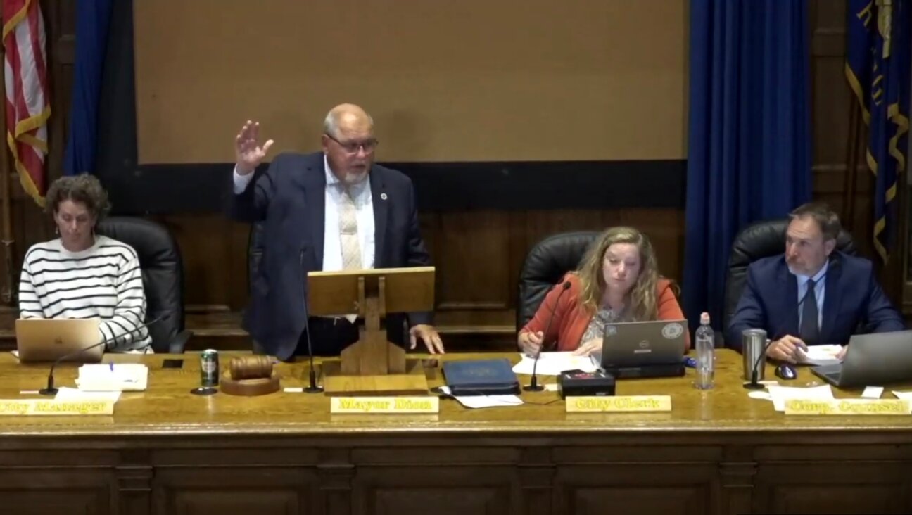 Mark Dion, mayor of Portland, Maine, votes in support of a city council resolution to divest from companies doing business with Israel, Sept. 4, 2024. The resolution passed unanimously over the objections of the local Jewish federation. (Screenshot)