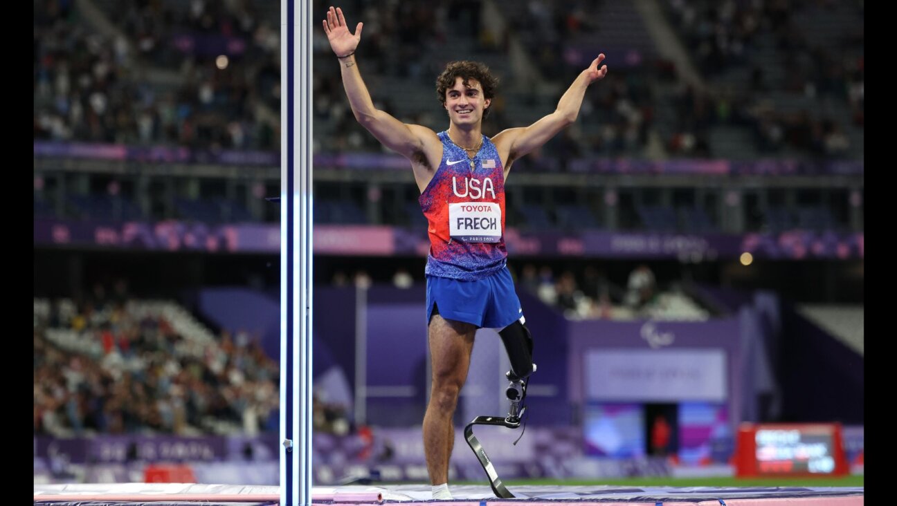 Ezra Frech celebrates after the men’s high jump T63 at the Paris 2024 Summer Paralympic Games, Sept. 3, 2024, in Paris. (Ezra Shaw/Getty Images)