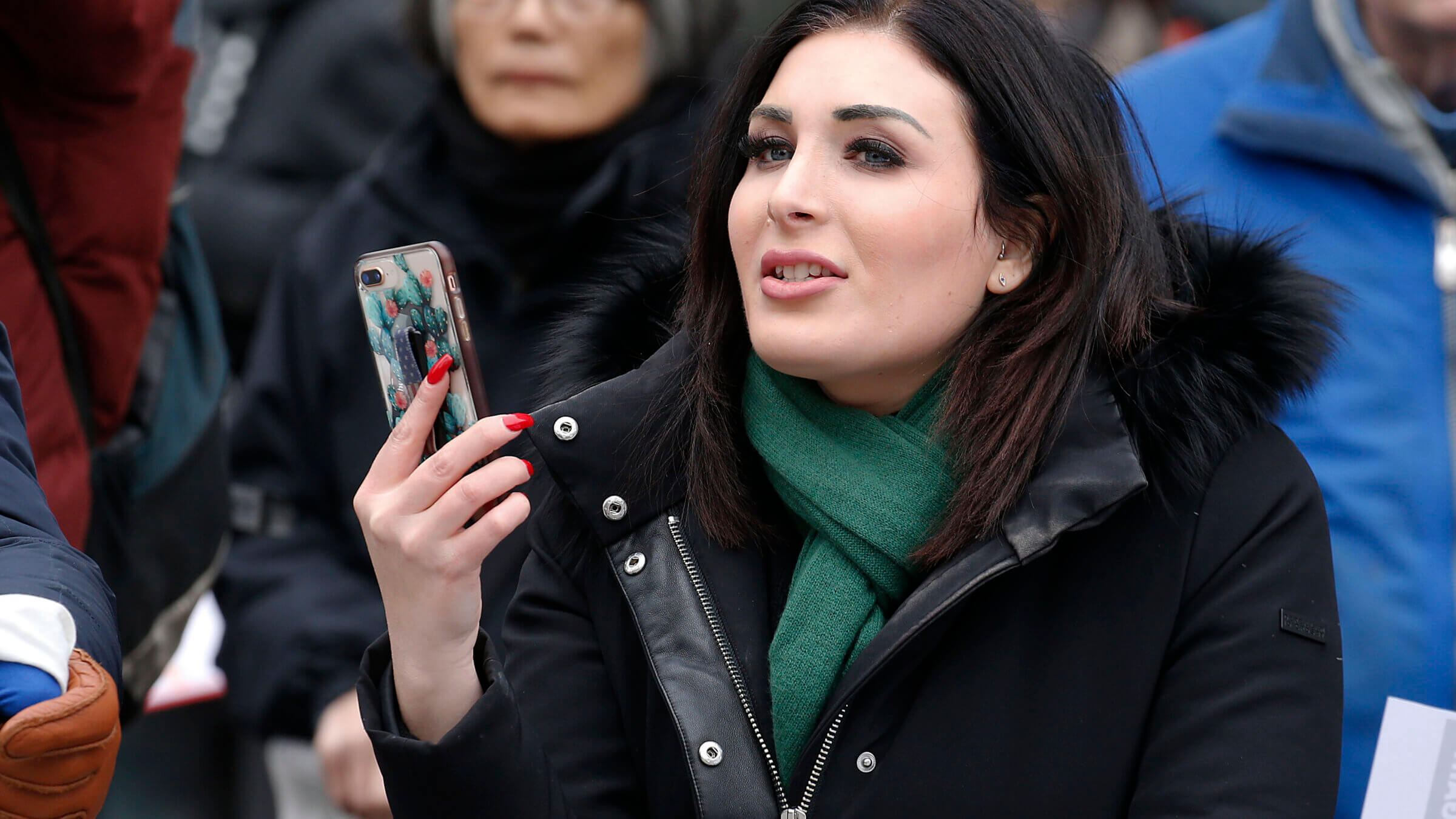 Laura Loomer stands across from the Women's March in  New York City on Jan. 19, 2019